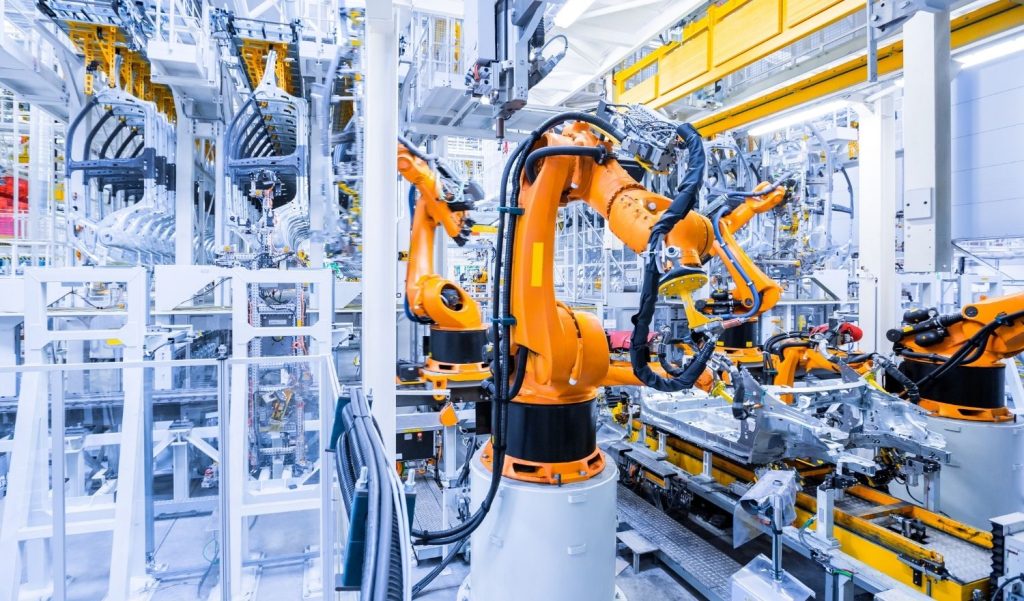 High-speed automated conveyor line operating smoothly with integrated Cognex vision sensors to prevent micro-shortages